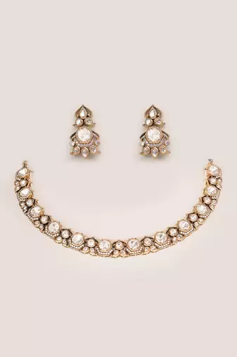 Bold and dramatic two tone finish kundan polki necklace set