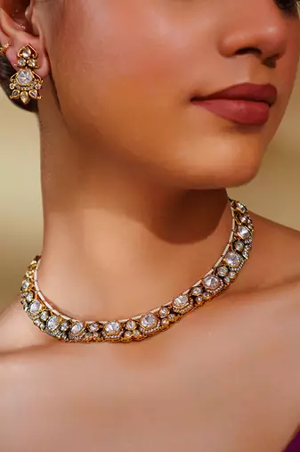 Bold and dramatic two tone finish kundan polki necklace set