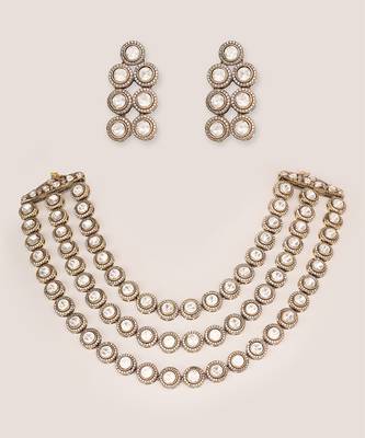Bold and dramatic 3- line kundan necklace with earrings 2