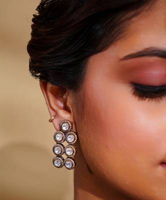 Bold and dramatic 3- line kundan necklace with earrings 3