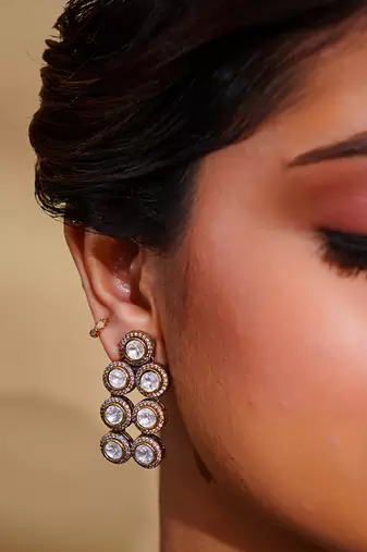 Bold and dramatic 3- line kundan necklace with earrings