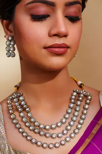 Bold and dramatic 3- line kundan necklace with earrings