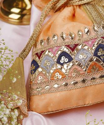 Peach brocade potli bag 4