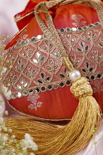 Orange pure silk brocade potli bag