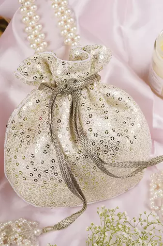 White georgette with silver sequin potli bag