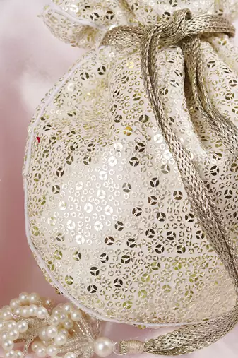 White georgette with silver sequin potli bag