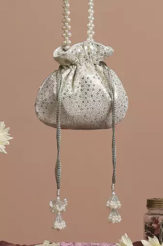 White georgette with silver sequin potli bag