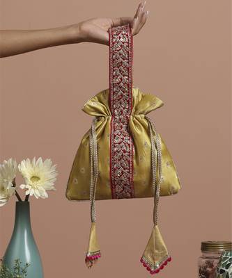 Magenta and pista pure silk potli bag 1