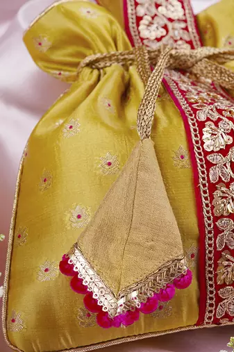 Magenta and pista pure silk potli bag