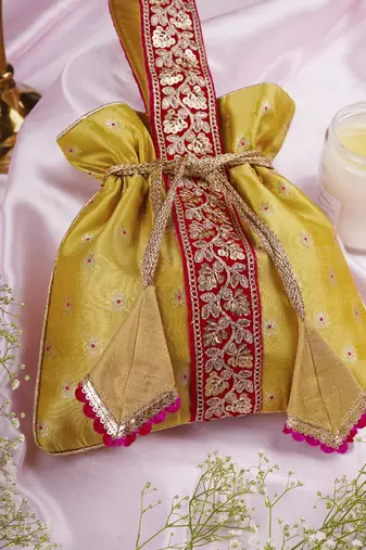 Magenta and pista pure silk potli bag
