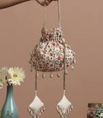 Cream and peach floral potli bag