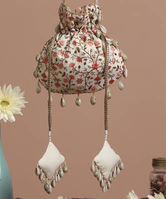 Cream and peach floral potli bag 2