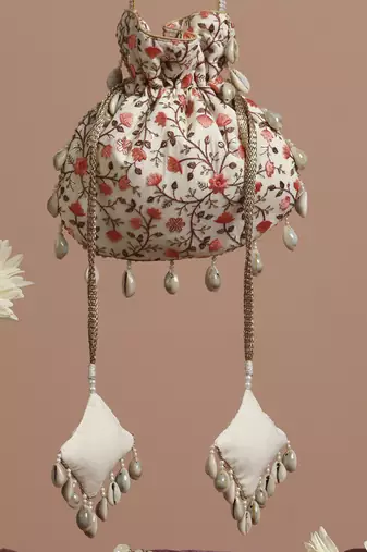 Cream and peach floral potli bag