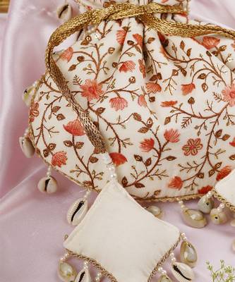 Cream and peach floral potli bag 3