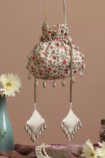 Cream and peach floral potli bag