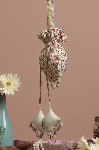 Cream and peach floral potli bag