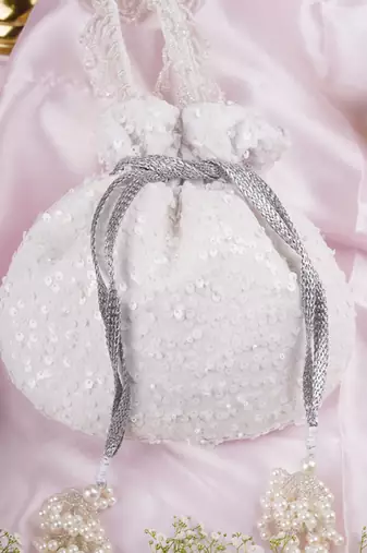 White georgette with sequin potli bag