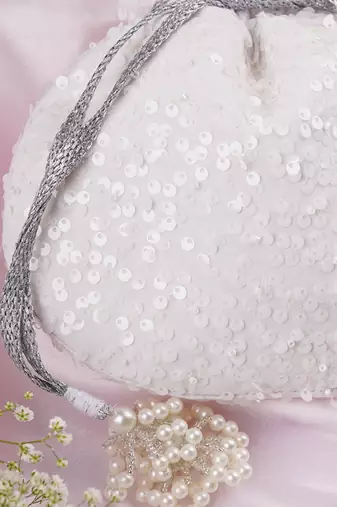 White georgette with sequin potli bag