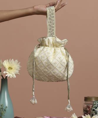 Yellow pure chinon with cutdana potli bag 1