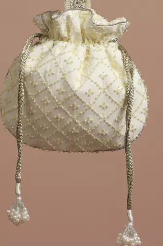 Yellow pure chinon with cutdana potli bag