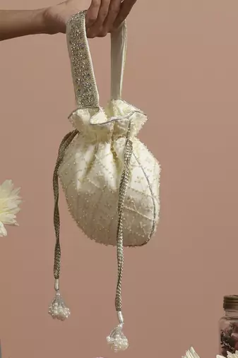 Yellow pure chinon with cutdana potli bag