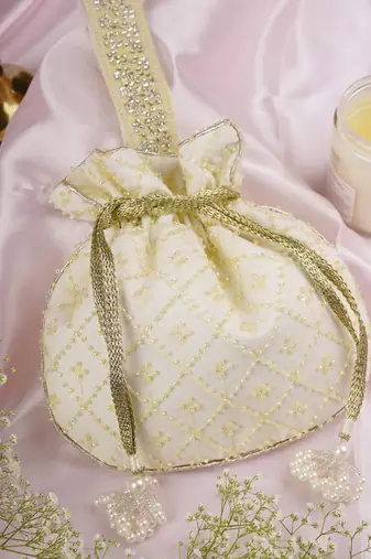 Yellow pure chinon with cutdana potli bag
