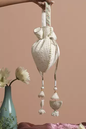 White georgette with gold sequin potli bag