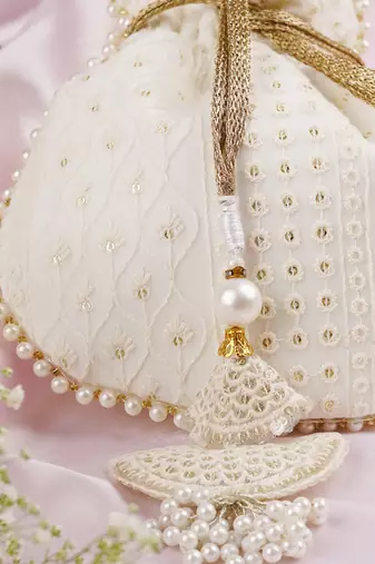White georgette with gold sequin potli bag