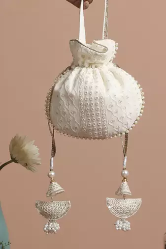 White georgette with gold sequin potli bag