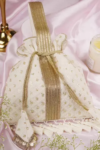 White georgette with gold sequin potli bag
