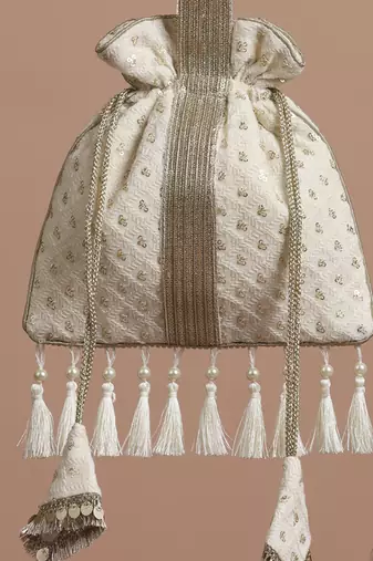 White georgette with gold sequin potli bag