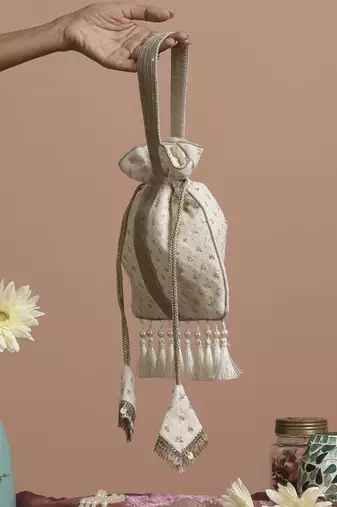 White georgette with gold sequin potli bag
