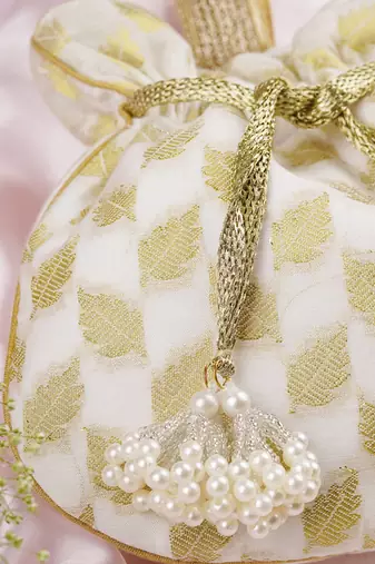 Gold and white chanderi potli bag