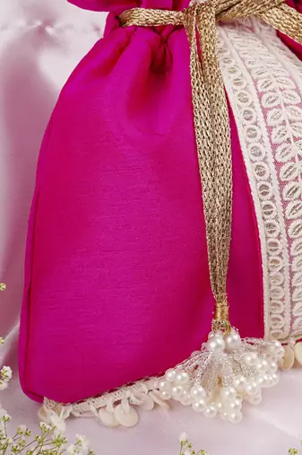 Magenta and white silk potli bag