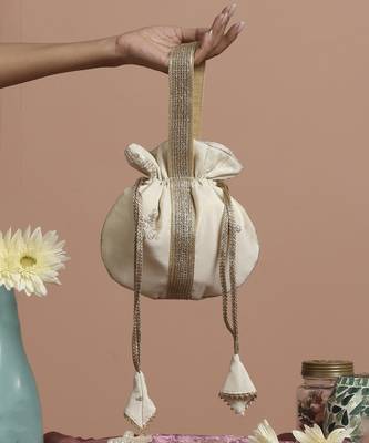 Cream and gold buti silk potli bag 1