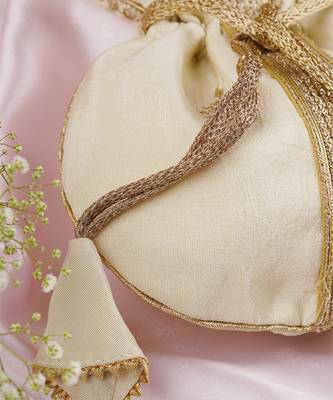 Cream and gold buti silk potli bag 3