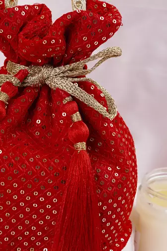 Red georgette with sequin potli bag