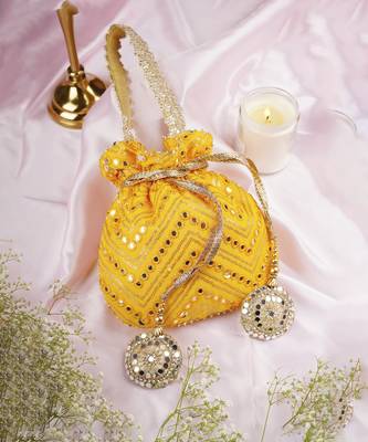 Yellow georgette with mirror work potli bag 1