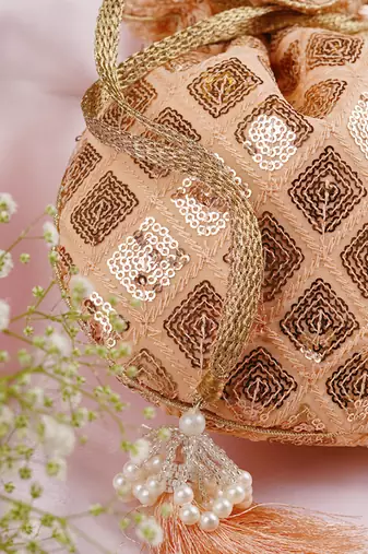 Peach georgette with sequin potli bag