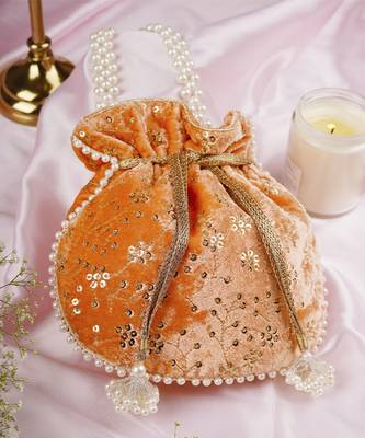 Peach velvet with embroidery potli bag 1