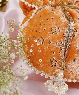 Peach velvet with embroidery potli bag 2