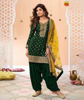 Dark green heavy jacquard silk semi stitched patiyala suits 1