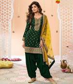 Dark green heavy jacquard silk semi stitched patiyala suits