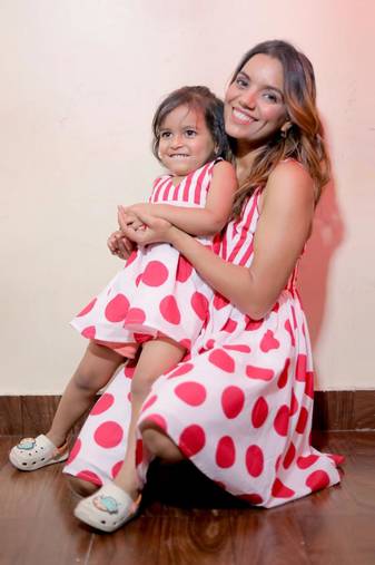 Radiant red polka dot matching dresses for mom and daughter