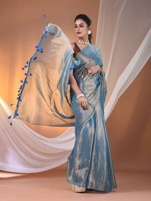 Blue tissue soft saree with pompom 2