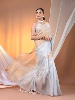 Golden and white tissue soft saree with pompom 2