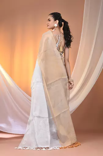 Golden and white tissue soft saree with pompom