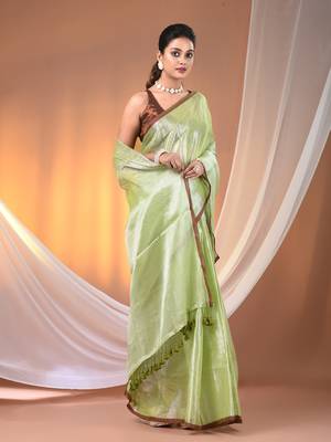 Light green tissue soft saree with pompom 2