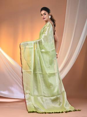 Light green tissue soft saree with pompom 3