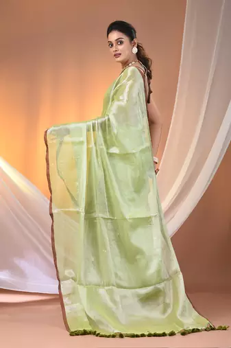 Light green tissue soft saree with pompom